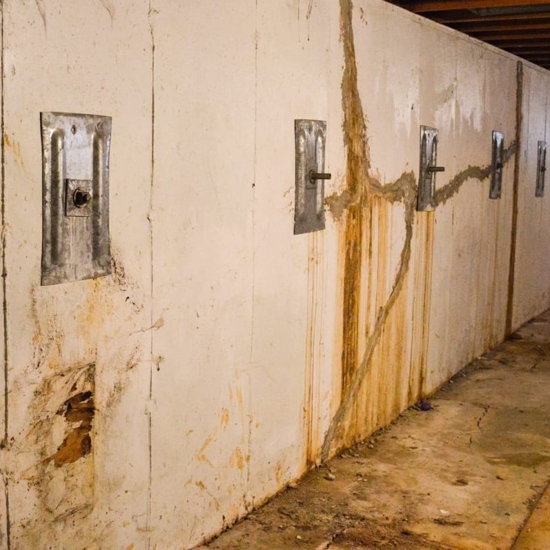 basement wall using deadman anchors