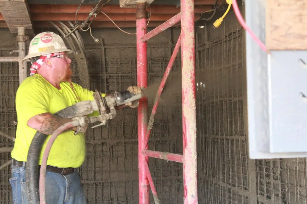 employee working on a foundation rebuild