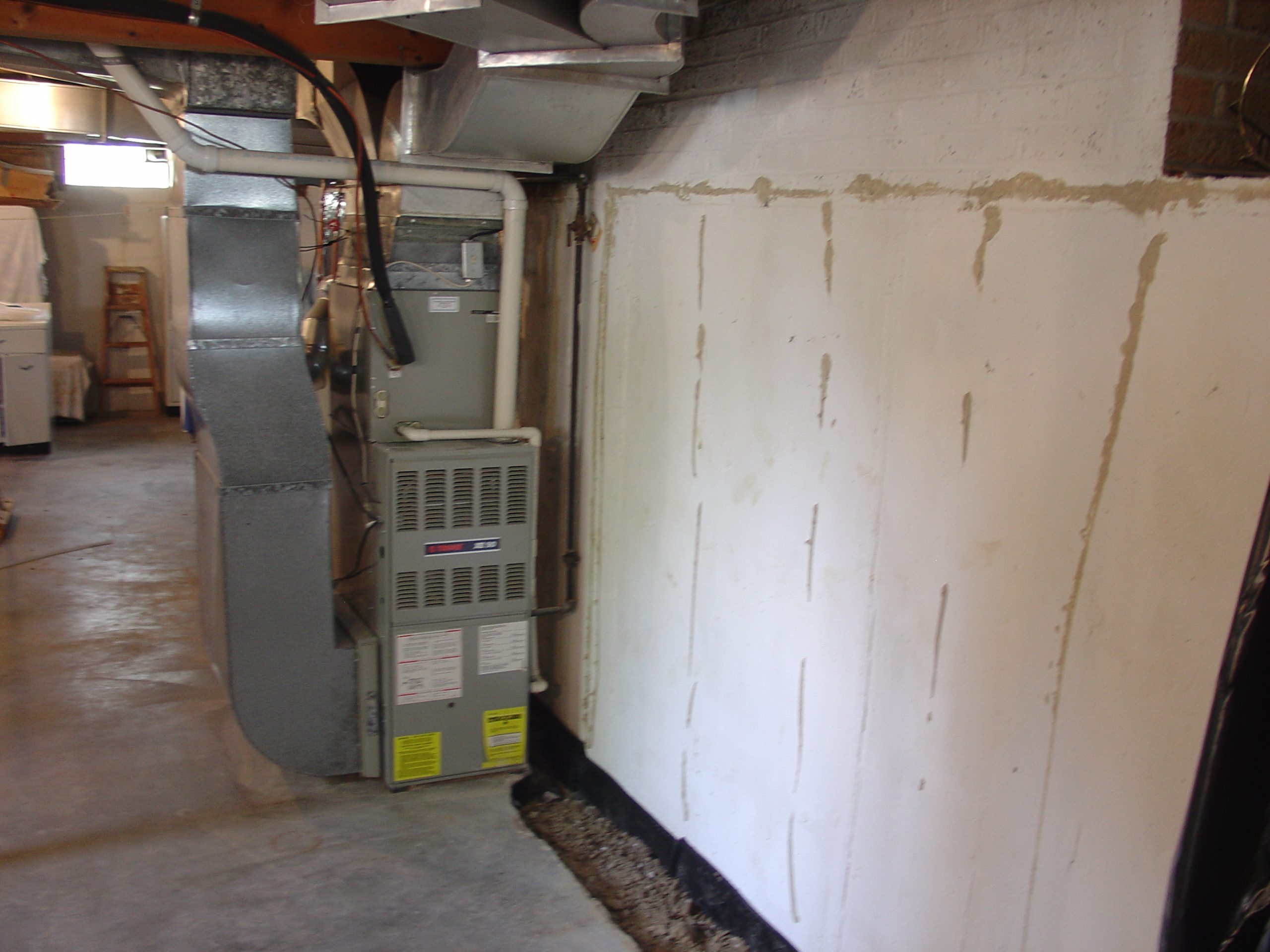 Waterproofing_Basement_Wall_Paneling_Before-scaled